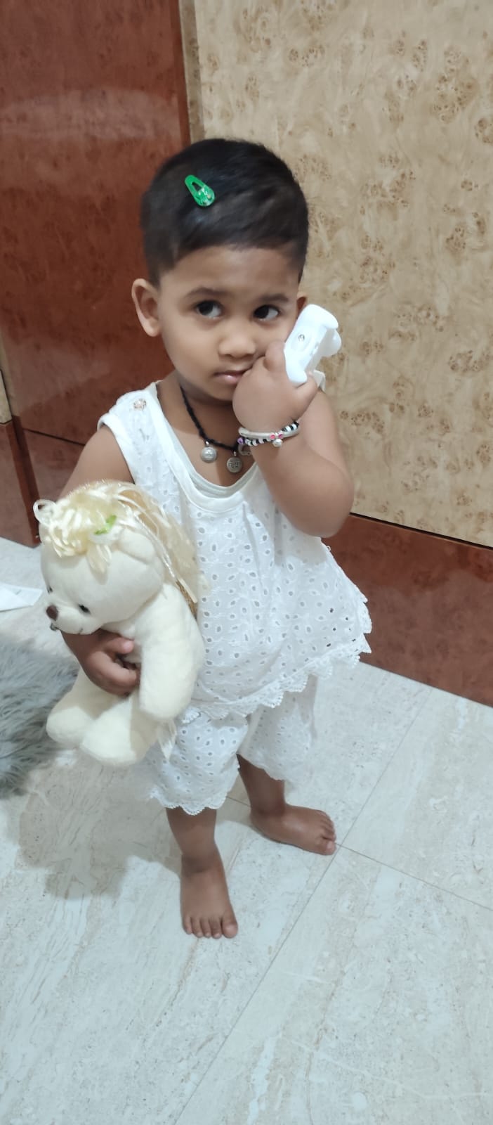 Toddler with teddy bear at PnP Day Care Centre Gurgaon