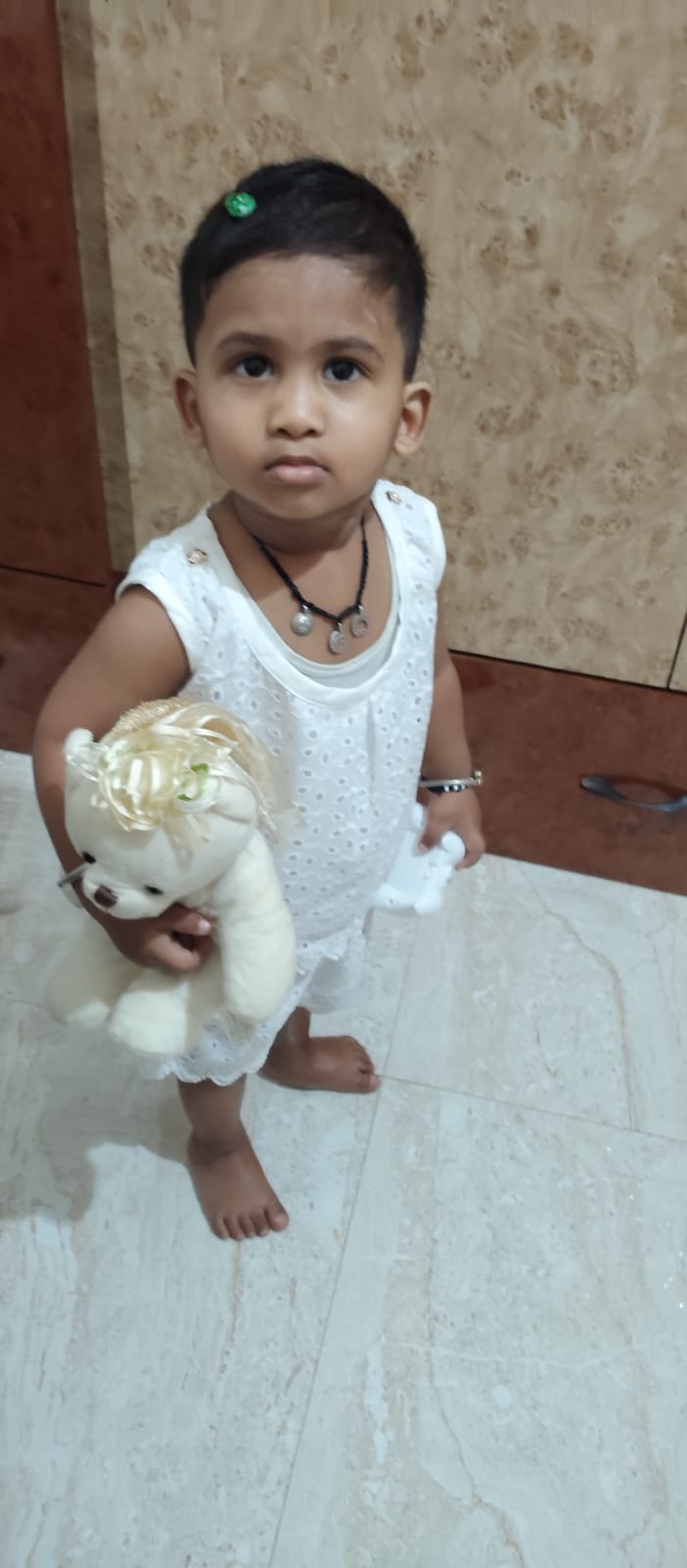 Girl with stuffed toy