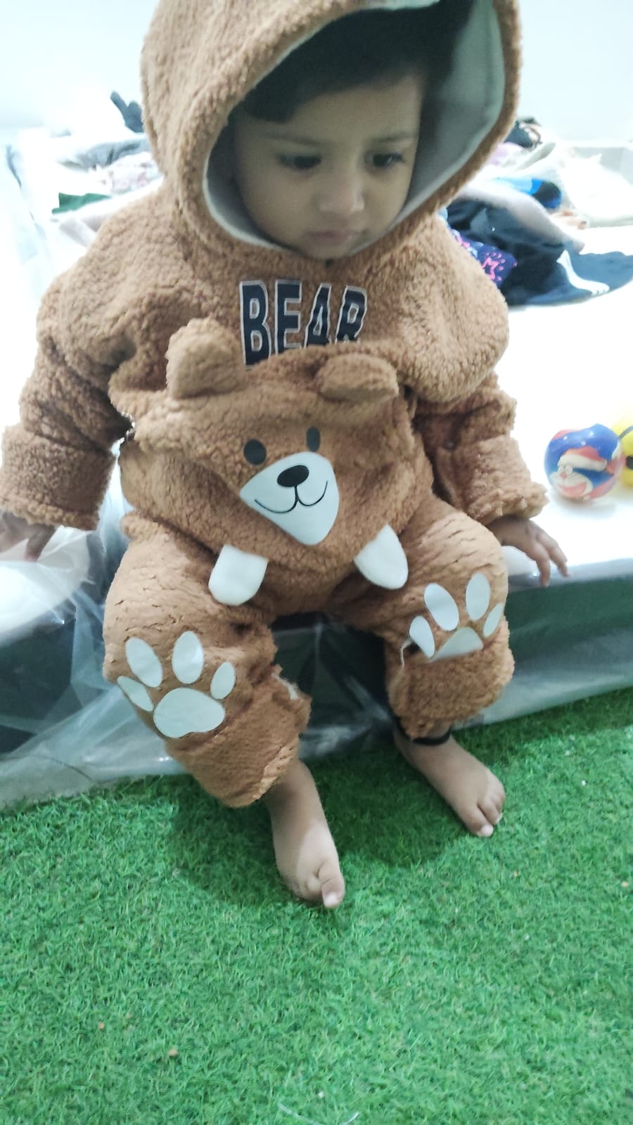Indoor grass mat play area